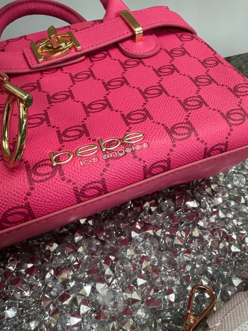 bebe Hot Pink Logo small Satchel with Gold-Tone Hardware and crossbody strap - Picture 13 of 16